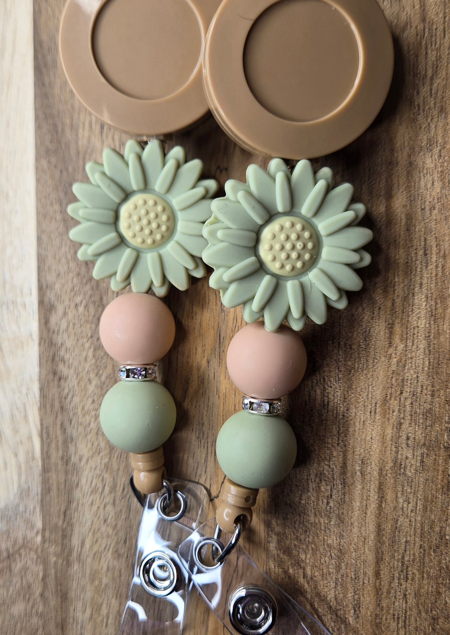 Brown Badge With A Daisy