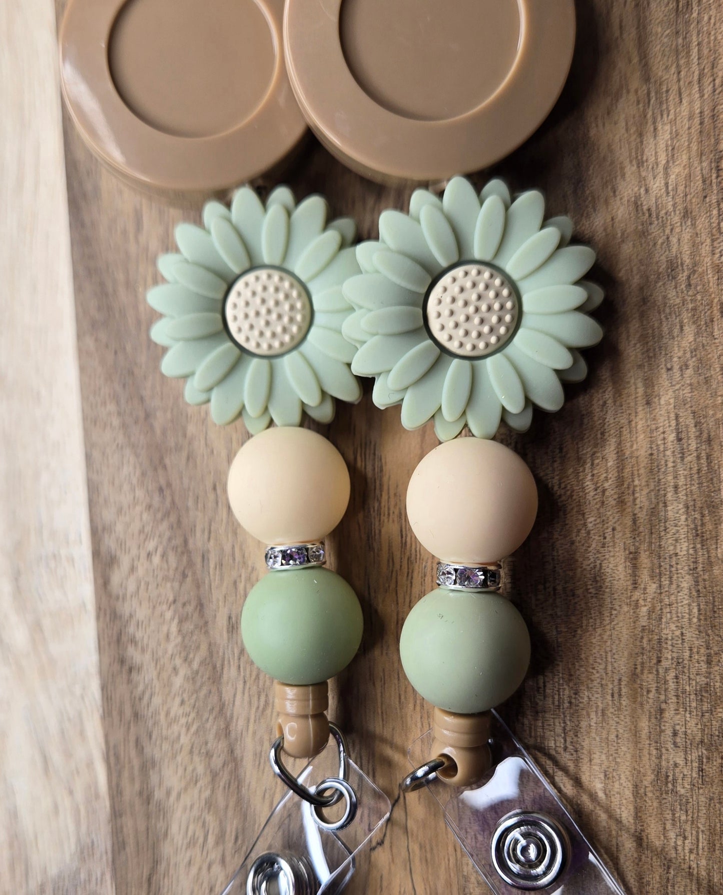 Brown Badge With A Daisy
