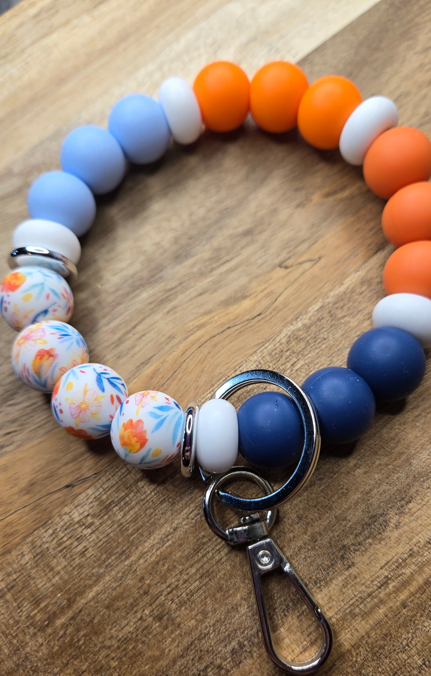 Orange/Blue Flower Wristlet