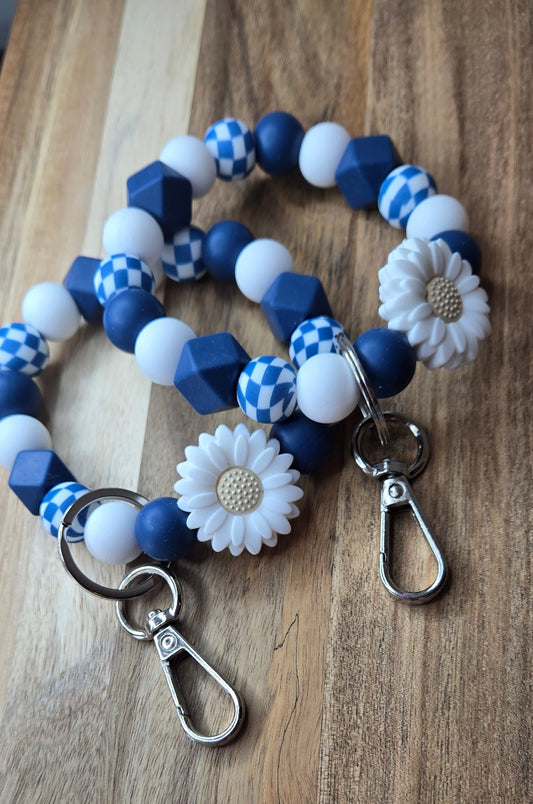 Cyan Checkered White Daisy Wristlet