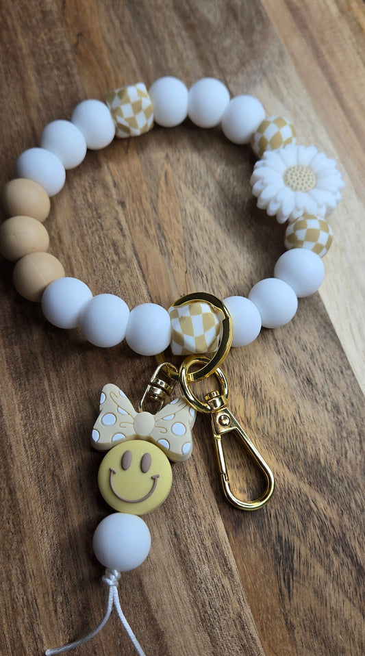 White/Tan White Daisy Wristlet with Bow Smile Tassel
