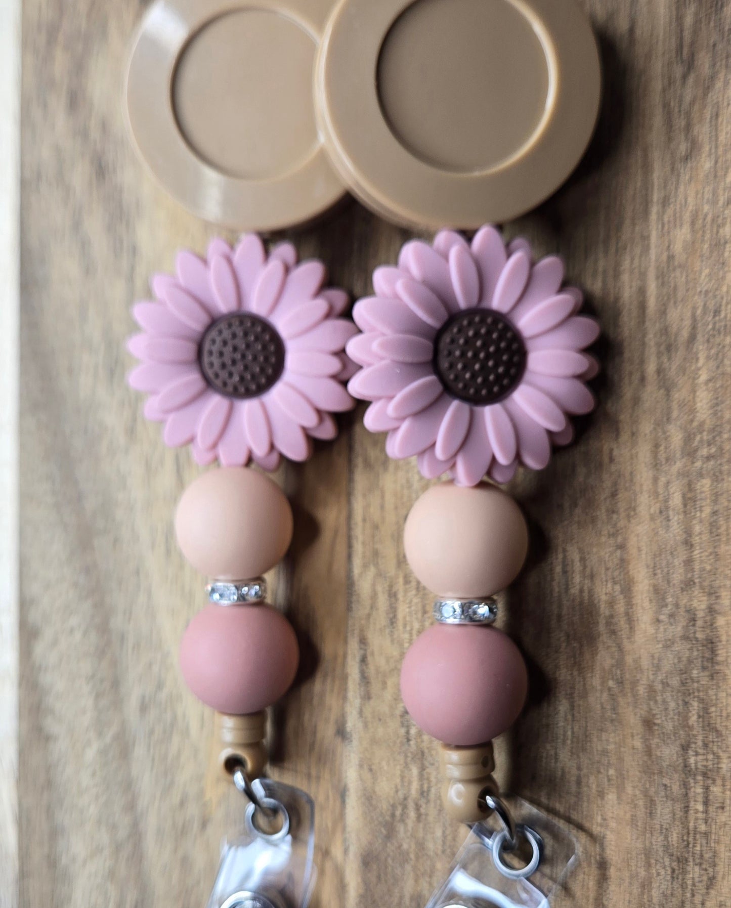 Brown Badge With A Daisy