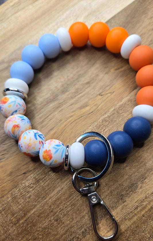 Orange/Blue Flower Wristlet