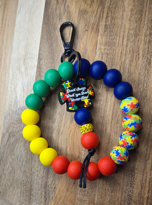Autism w/ Puzzle Tassel Wristlet