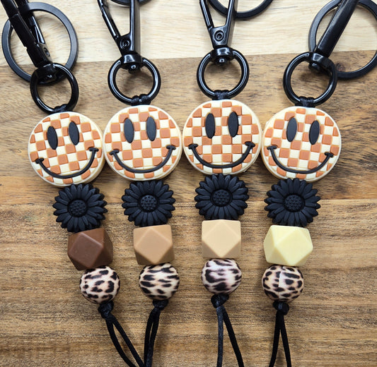 Tan Checkered Smile w/ Animal Print Keychains